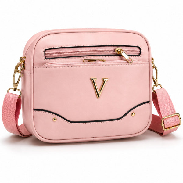 Bolso cruzado rosado con correa ajustable y detalles dorados
