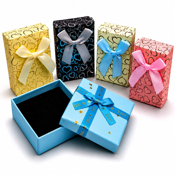 Cajas de regalo decorativas con lazos en varios colores